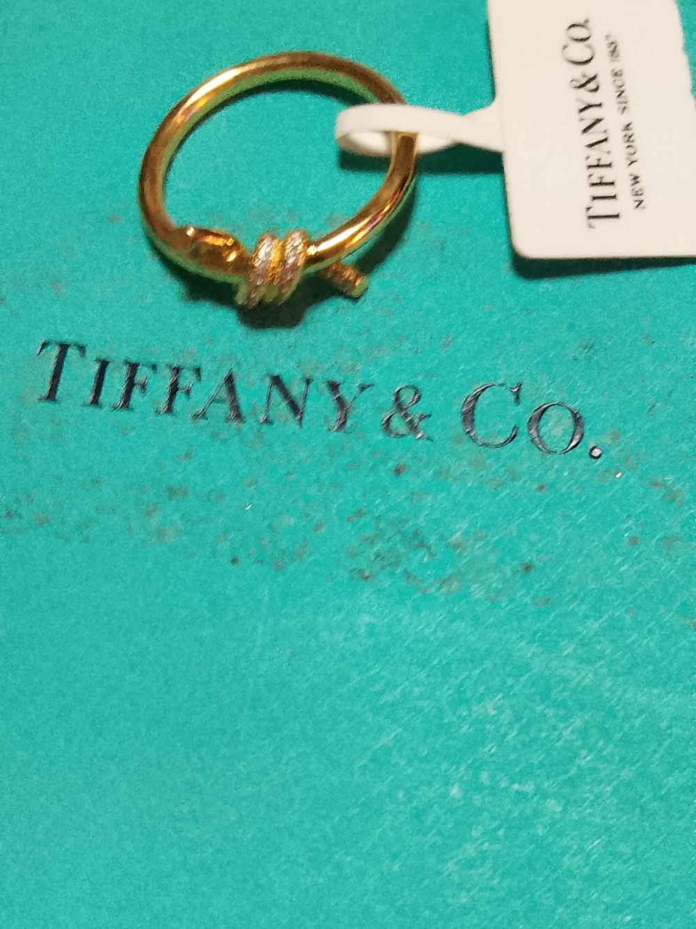Tiffany & Co. Gold Knot Ring with Pavé Accent